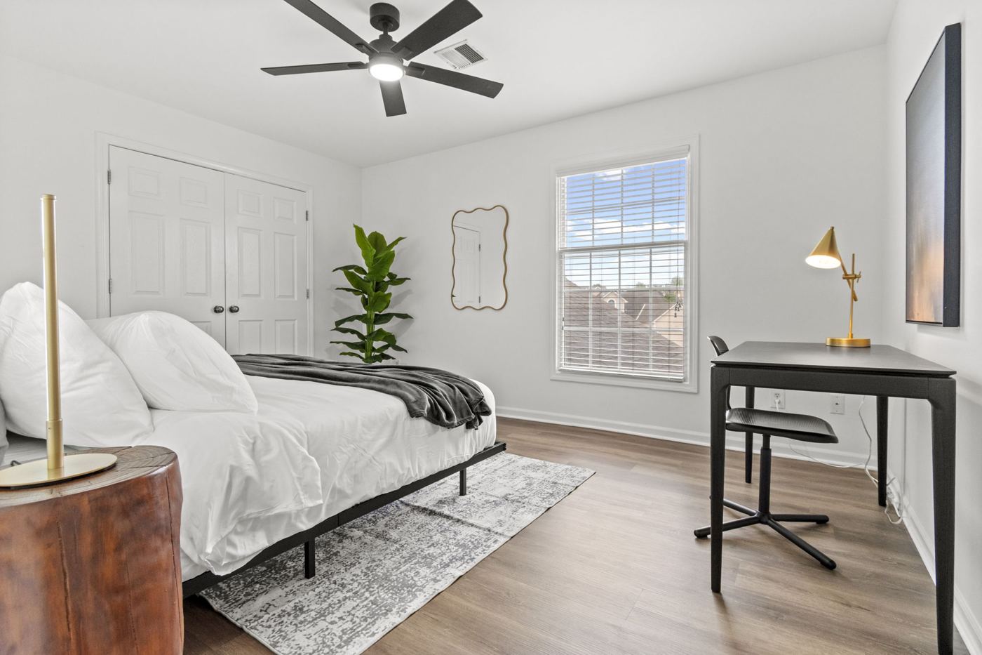 Second bedroom with king bed and desk