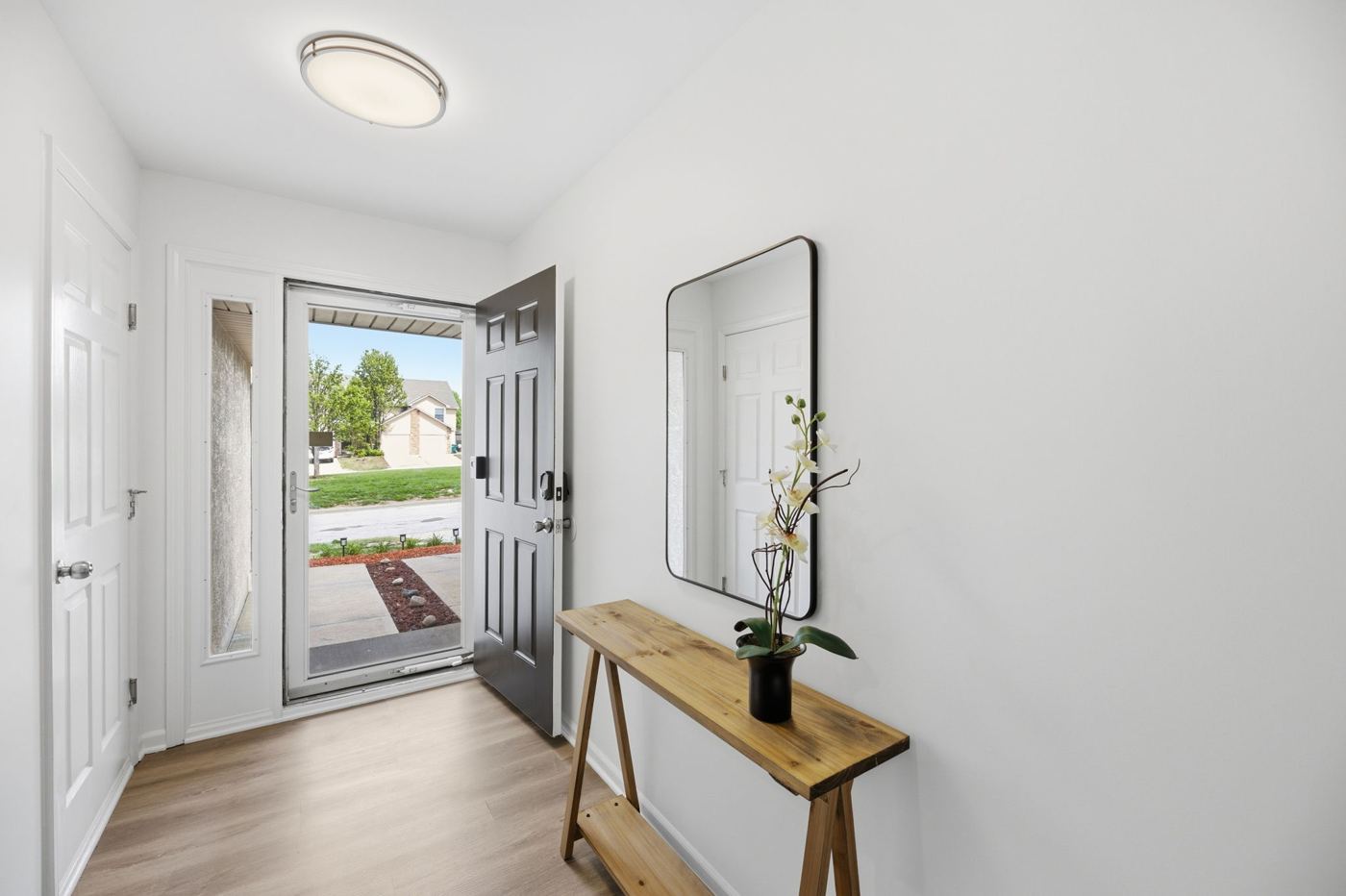 Front entry with console table and mirror